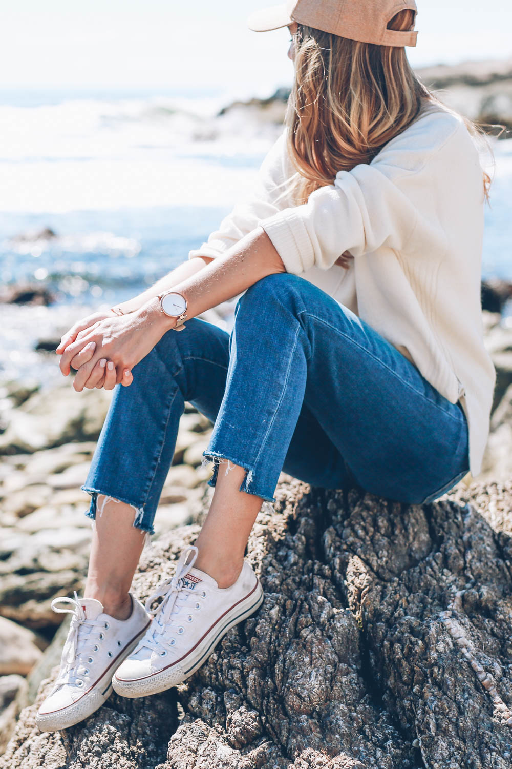Jess Ann Kirby in converse sneakers and Paige denim in Newport Rhode Island shares the past four years as a blogger