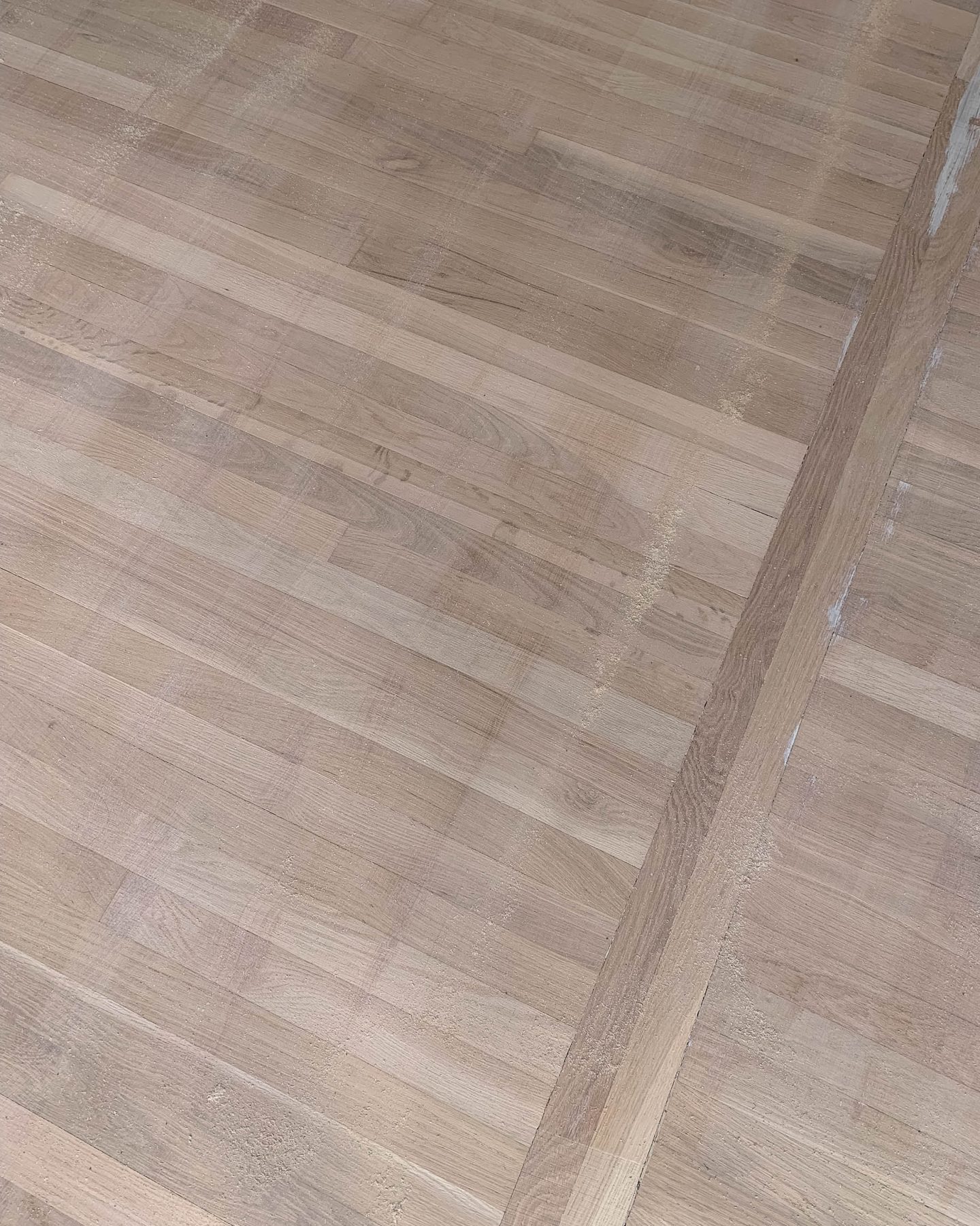 Jess Ann Kirby describes the floors in her home before they were refinished with hardwax oil.