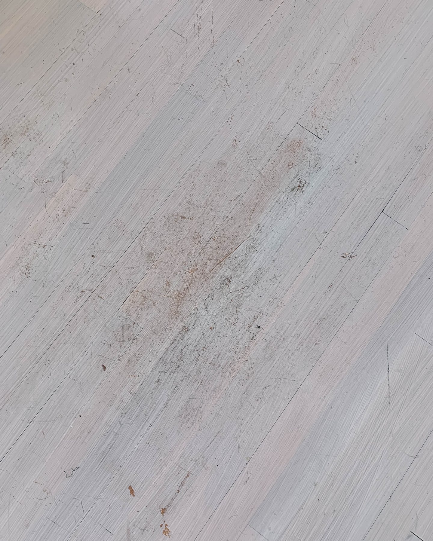 Jess Ann Kirby describes the floors in her home before they were refinished with hardwax oil.
